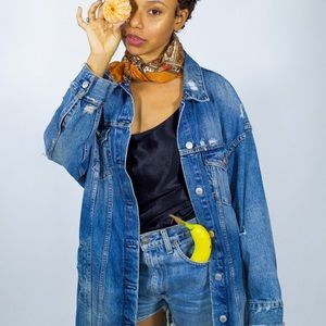 Distressed oversized denim jacket